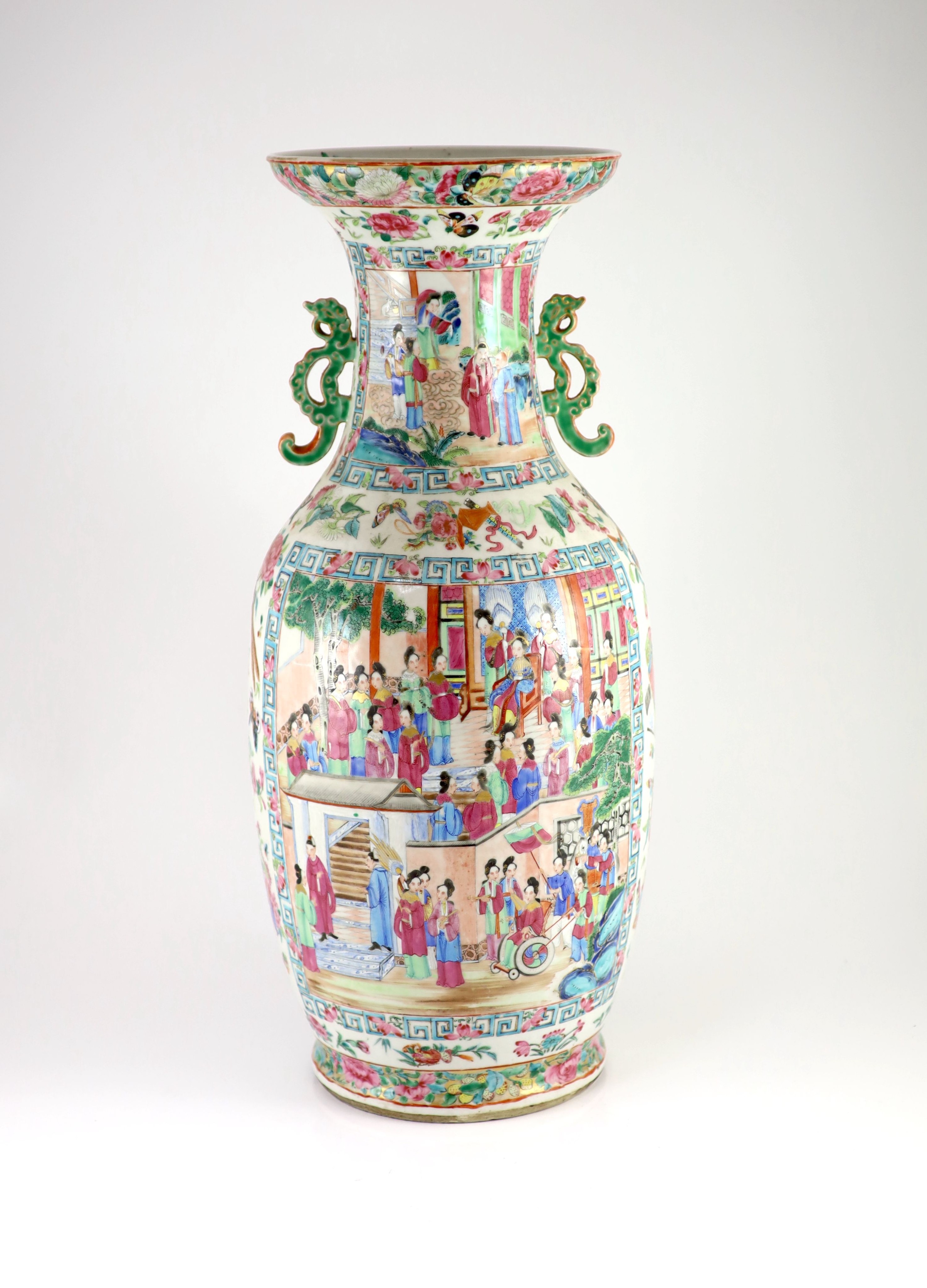 A pair of large Chinese famille rose twin handled vases, mid 19th century, 60 cm high, one vase broken and repaired